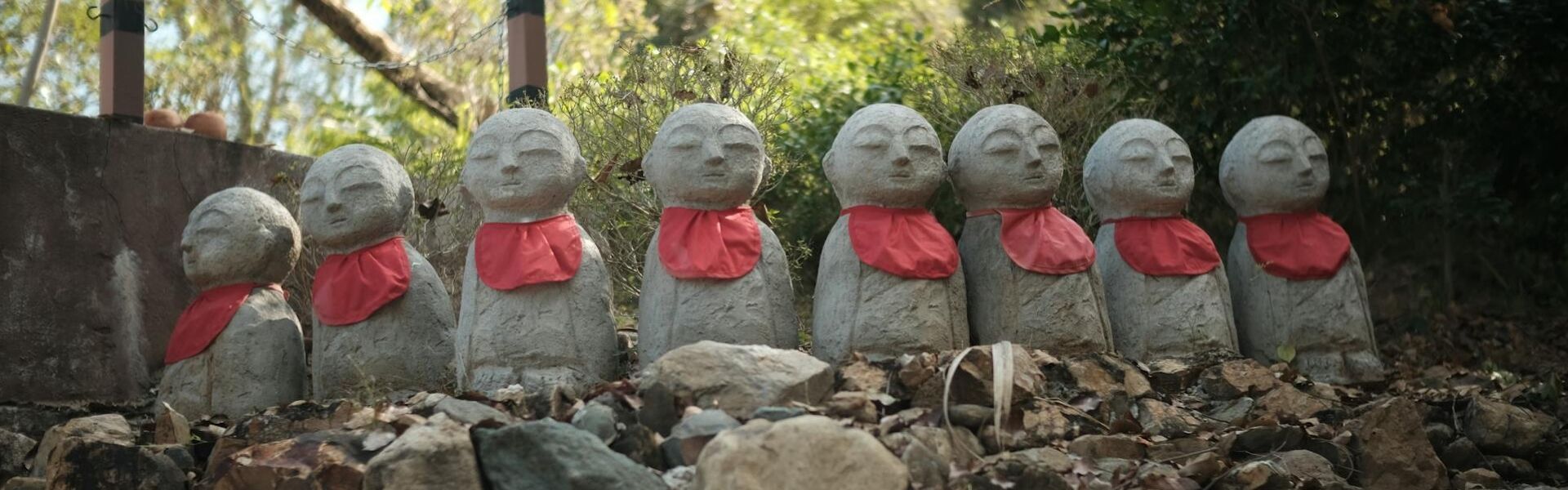 Lampang’s tranquil temple grounds in Thailand on a Lampang Travel banner by Legend Travel Group.